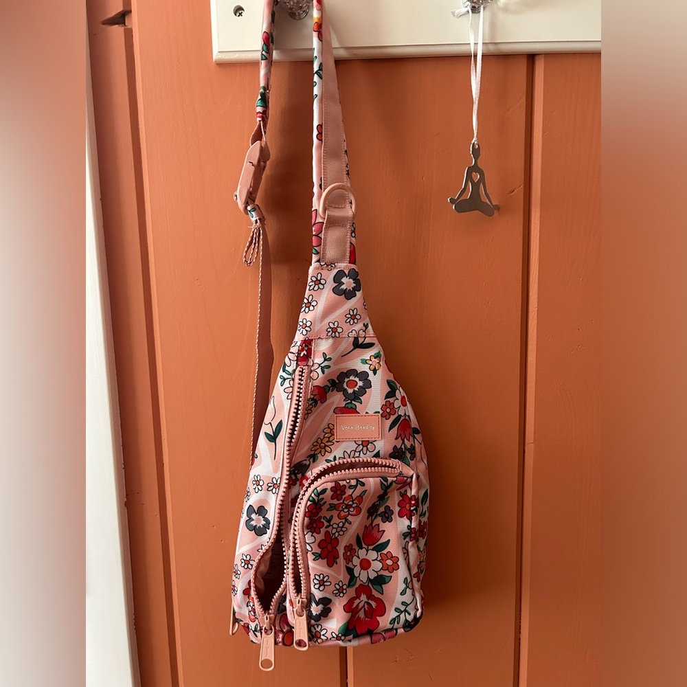 Vera Bradley crossbody mini sling backpack in excellent shape. No signs of wear.